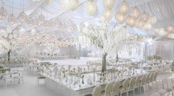 Luxurious wedding table setting with gold accents