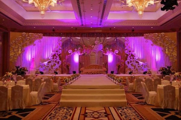 Sophisticated candlelit wedding aisle decor