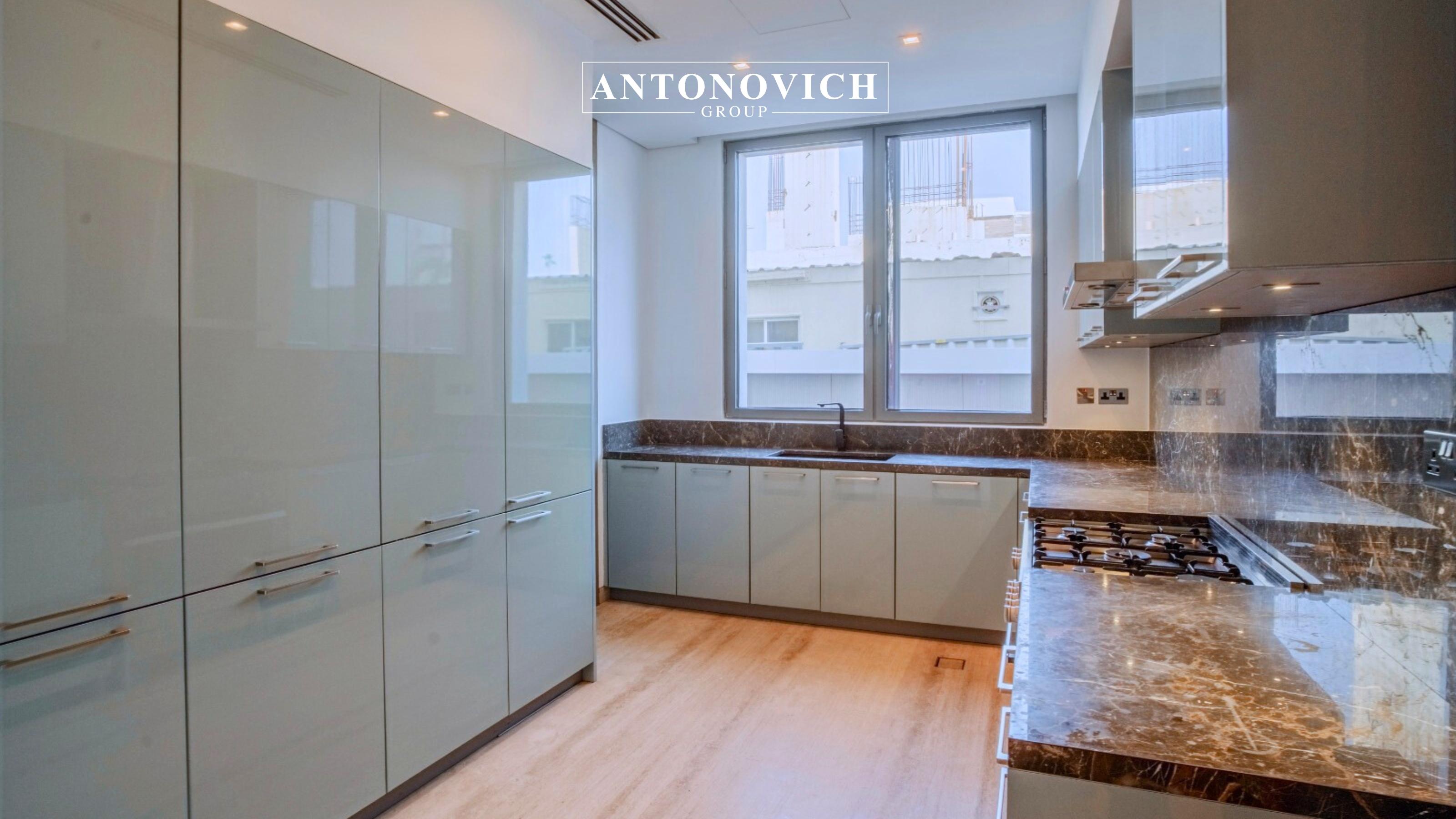 Bespoke Kitchen Joinery Solutions for Luxury Palm Jumeirah Villas Complementing the grand living room, the villa’s kitchen interior was designed as a refined extension of the modern luxury concept. Antonovich Group delivered a fully customized kitchen joinery solution tailored specifically for this Palm Jumeirah luxury villa, combining aesthetics, functionality, and precision craftsmanship. The kitchen features bespoke joinery, produced in Antonovich Group’s own furniture and joinery facilities, ensuring absolute control over quality and detailing. Custom cabinetry was designed with clean architectural lines, premium finishes, and seamless integration of high-end appliances. Natural wood veneers, lacquered panels, and stone countertops were carefully selected to harmonize with the villa’s modern interior palette. Every detail—from concealed storage systems to soft-close mechanisms—reflects Antonovich Group’s reputation as a leader in luxury kitchen design and joinery in Palm Jumeirah Dubai. The result is a kitchen that functions as both a high-performance culinary space and a sophisticated design statement, ideal for luxury villa living. SEO niche keywords integrated include: Luxury kitchen joinery Palm Jumeirah Custom kitchen design Dubai Bespoke kitchen interiors Palm Jumeirah High-end villa kitchen Dubai Private Home Cinema Interior Design: A Luxury Entertainment Experience In addition to the main living areas, Antonovich Group designed and executed a private home cinema interior that elevates entertainment to a new level of luxury. Designed exclusively for this modern luxury villa in Palm Jumeirah, the home cinema combines advanced technology with refined interior aesthetics. The space was acoustically engineered to ensure optimal sound performance, with wall treatments, ceiling panels, and flooring finishes carefully selected to enhance audio quality. Custom-designed seating, upholstered in premium materials, provides maximum comfort while maintaining visual elegance. Lighting was strategically layered to create a cinematic atmosphere, while bespoke wall cladding and joinery details reinforce the villa’s modern luxury identity. This meticulous approach demonstrates Antonovich Group’s expertise in luxury home cinema interior design in Dubai, where comfort, technology, and design coexist seamlessly. Bespoke Kitchen Joinery Solutions for Luxury Palm Jumeirah Villas Complementing the grand living room, the villa’s kitchen interior was designed as a refined extension of the modern luxury concept. Antonovich Group delivered a fully customized kitchen joinery solution tailored specifically for this Palm Jumeirah luxury villa, combining aesthetics, functionality, and precision craftsmanship. The kitchen features bespoke joinery, produced in Antonovich Group’s own furniture and joinery facilities, ensuring absolute control over quality and detailing. Custom cabinetry was designed with clean architectural lines, premium finishes, and seamless integration of high-end appliances. Natural wood veneers, lacquered panels, and stone countertops were carefully selected to harmonize with the villa’s modern interior palette. Every detail—from concealed storage systems to soft-close mechanisms—reflects Antonovich Group’s reputation as a leader in luxury kitchen design and joinery in Palm Jumeirah Dubai. The result is a kitchen that functions as both a high-performance culinary space and a sophisticated design statement, ideal for luxury villa living. SEO niche keywords integrated include: Luxury kitchen joinery Palm Jumeirah Custom kitchen design Dubai Bespoke kitchen interiors Palm Jumeirah High-end villa kitchen Dubai Private Home Cinema Interior Design: A Luxury Entertainment Experience In addition to the main living areas, Antonovich Group designed and executed a private home cinema interior that elevates entertainment to a new level of luxury. Designed exclusively for this modern luxury villa in Palm Jumeirah, the home cinema combines advanced technology with refined interior aesthetics. The space was acoustically engineered to ensure optimal sound performance, with wall treatments, ceiling panels, and flooring finishes carefully selected to enhance audio quality. Custom-designed seating, upholstered in premium materials, provides maximum comfort while maintaining visual elegance. Lighting was strategically layered to create a cinematic atmosphere, while bespoke wall cladding and joinery details reinforce the villa’s modern luxury identity. This meticulous approach demonstrates Antonovich Group’s expertise in luxury home cinema interior design in Dubai, where comfort, technology, and design coexist seamlessly.