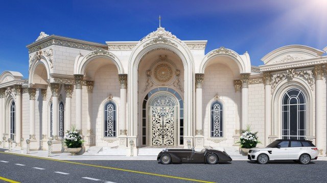 This picture shows a white and black spaniel puppy sitting on a red couch. The puppy appears to be in a relaxed pose, with its eyes half closed and its tongue hanging out. The puppy is wearing a red and yellow plaid bowtie around its neck.
