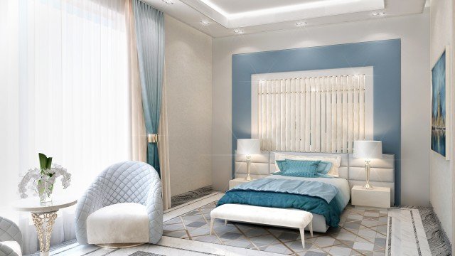 This picture shows two adolescent boys playing a game of American football. They are both dressed in football uniforms and one is quarterbacking while the other is running back with the ball.