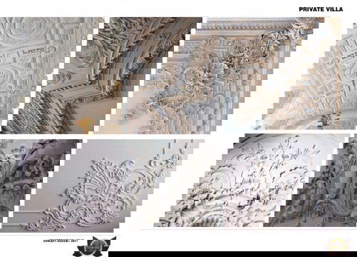 The picture shows a woman wearing a red dress and a white sweater, standing in front of a brick wall with graffiti on it. She is facing the camera with her hands clasped in front of her body.