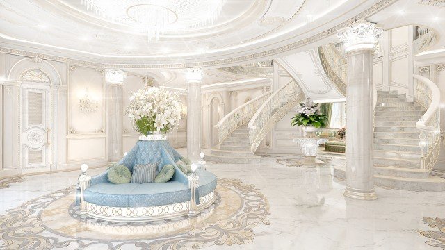 This picture shows a white and tan beach scene with crashing waves and a sun setting in the background. The horizon is lined with palm trees and the beach itself is made up of white sand and stones. There are a few people walking along the shoreline and enjoying the warm evening.