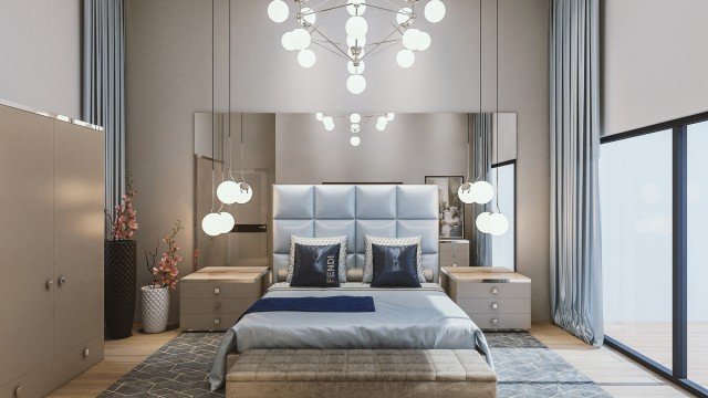 This picture shows a cluster of orange mushrooms growing on top of a tree stump. The mushrooms appear to be clustered in groups. They each have a small, orange cap with white gills underneath.