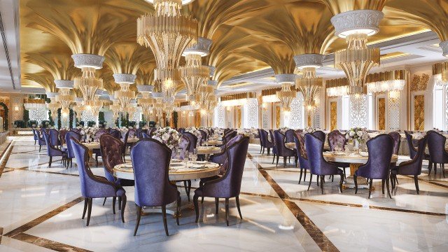 The picture appears to be of a sandy beach with several people walking along it. The ocean and sky are visible in the background, and there are some palm trees in the foreground.