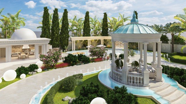 This picture appears to be of a washing machine being filled with water. It is a modern, front loading washer with a bright white finish. The controls are on the top of the machine, and it has a large detergent tray for adding laundry detergent and fabric softener.