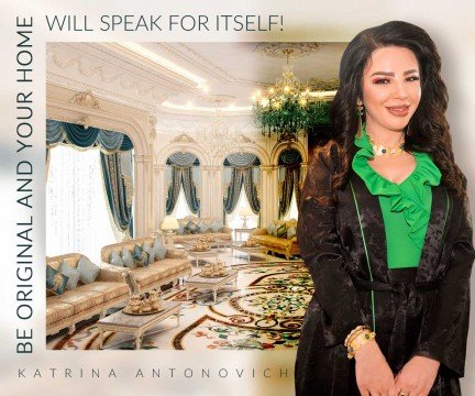 This picture is of a woman standing on top of a mountain, looking off into the distance with her arms outstretched. The sky is painted in a wash of red and orange hues as the sun is setting in the background. The woman appears to be in awe and enjoying the beauty of nature.