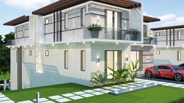 This picture shows a modern living room designed by Antonovich Design. It features a comfy leather sectional sofa in a warm grey tone, a matching ottoman in the center, a glass coffee table with a light wood frame, and a few abstract art pieces on the walls. The walls and ceiling are painted in a soft white color, which showcases the furniture and decor items nicely.