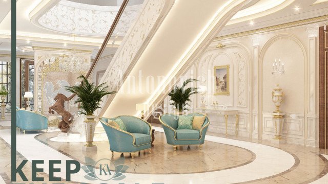 This picture shows an elegant and luxurious living room. The room features a deep blue velvet couch combined with white and gold accents and velvet pillows. The room also has a white marble fireplace, a large framed mirror, and a white shag rug. A modern chandelier and floor lamp provide additional lighting.