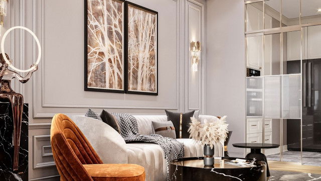 This picture shows a classic modern style living room featuring a white L-shaped couch, white and beige wall accents, and a light wood floor. There is an indoor plant in the corner and a glass coffee table in the middle of the room. The walls are adorned with black wall art to add a hint of contrasting color to the bright white and beige tones. Overall, the room has a bright and airy feeling, making it a perfect place for relaxation and entertainment.