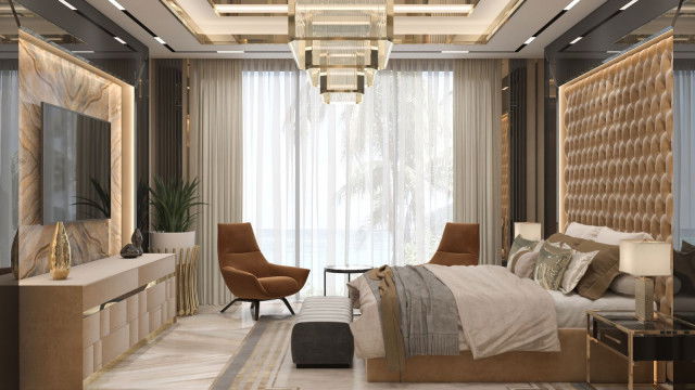 This picture shows an ultra-modern luxury kitchen with stainless steel appliances and cabinets. The walls are a pale shade of blue, and the countertops are a sleek, white stone. There is a large island in the center of the room with contemporary stools, and an oversized white pendant light hangs from the ceiling.