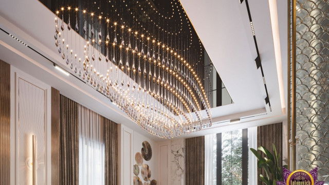 A contemporary lobby with a polished marble floor, a patterned geometric wall covering, mirrored accents and a stylish seating area.