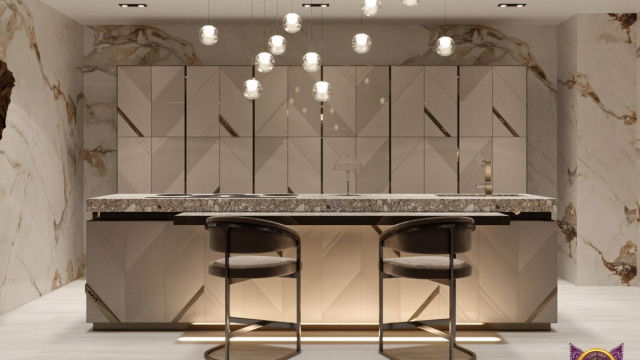 This picture is of a modern contemporary living room in shades of white and beige. There is a large white leather sofa situated in the middle of the room with matching accent chairs lined up on either side. A white fur rug is laid out in the center of the room, with an intricate dark wood coffee table in the center. The walls are mostly white but there are also some wall accents in black and beige. On the far wall is a large flat-screen television mounted on the wall with a modern fireplace beneath it. Soft lighting fixtures are spread throughout the room, with tall plant