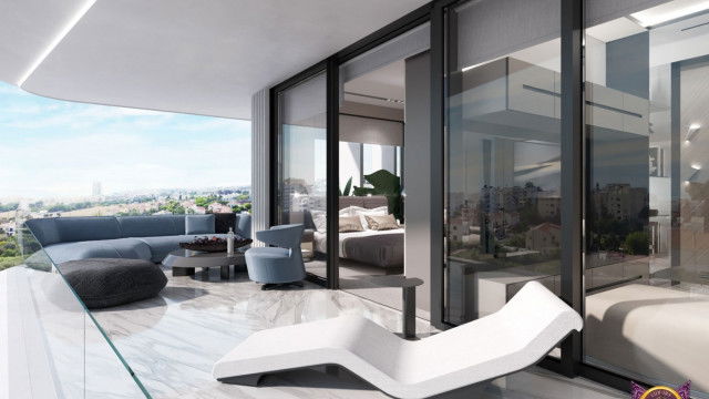 This image shows off a classic living room design with a modern twist. The room features a beige sofa with light blue accent pillows, a white armchair, and an elegant black coffee table. The walls are painted in a light gray shade and accessorized with framed artwork and a large silver mirror. The room also has a luxurious chandelier as a centerpiece creating a warm and inviting atmosphere.