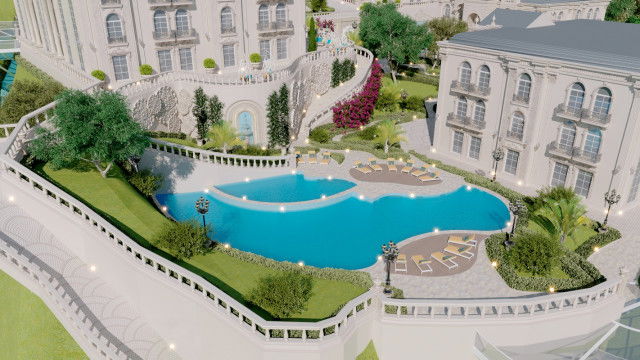 This picture depicts an interior design project by Antonovich Design. The image features a luxurious living room space filled with soft white walls and furniture, accented by modern pops of yellow. On the left side of the room is a white couch, two matching armchairs and a classic-style coffee table. Other touches include a pair of paintings hung on the wall above the couch, a mirror placed next to the armchairs, and a sophisticated white sideboard with yellow details. On the right side of the room is a large window with sheer curtains, allowing natural light to come in.