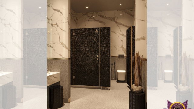 Modern styled interior with a curved ceiling, featuring a chandelier and recessed lighting in white and gold.