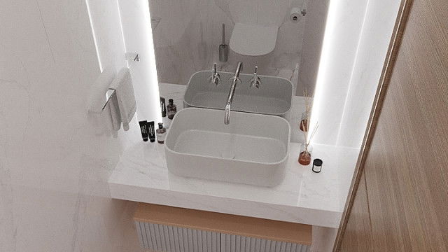 This picture shows the interior of a luxurious modern home, designed by Antonovich Design. It features a spacious living area with dark brown sofas and marble flooring, as well as a large abstract art piece displayed on the wall. A bar area is also visible, with a long grey countertop, bar stools and mirrored shelving. The warm and inviting atmosphere of the room is further enhanced by the presence of plants and other decorative elements.