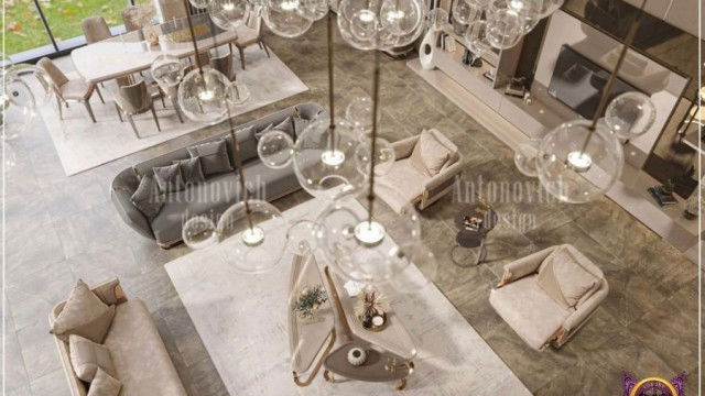 An intricately decorated ceiling featuring a floral medallion at its center with detailed patterned molding around its circumference.