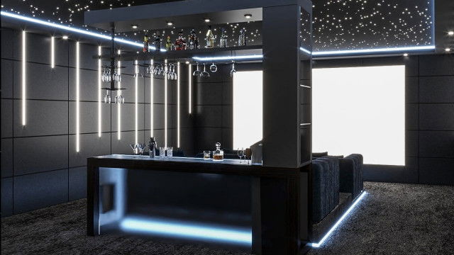 This picture shows an outdoor terrace design with a modern luxury feel. The terrace features comfortable seating, a pool surrounded by lush greenery, and numerous lights hanging from above to illuminate the area. A few large potted plants provide some privacy, while stone pathways add texture throughout the space. Overall, this terrace has a sophisticated and inviting atmosphere.