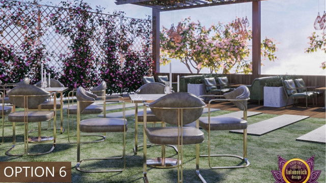 This picture shows a modern luxury bathroom with a large glass walk-in shower, Mosaic tile flooring, a freestanding bathtub, and a vanity with an integrated sink. The walls are finished in neutral colors and feature decorative sconces for additional lighting.