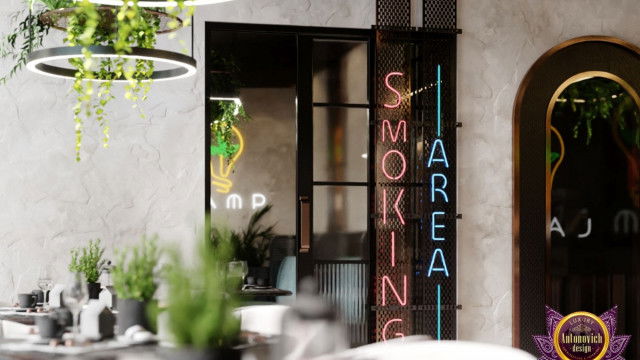 A luxurious bedroom featuring a large bed with a tufted headboard, ornate mirror, and chic chaise lounge.
