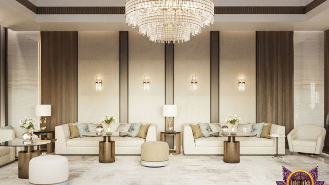 This picture shows a modern and luxurious gold-accented bathroom with a white marble countertop, a black-and-white patterned wall behind the sink, and a large glass shower enclosure. There is a freestanding bathtub in front of the countertop, and a small window near the ceiling of the bathroom. In the corner, there is a built-in shelf with a small plant, and a built-in storage cabinet beneath it.