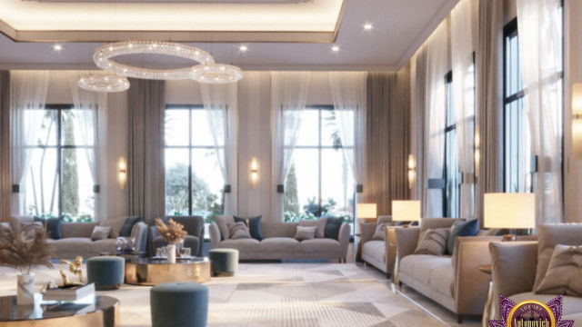 The picture shows a luxurious modern bedroom featuring white walls and furniture, with a bed frame and headboard upholstered in rich pink velvet. The bed is surrounded by several ornate gold lamps and accessories, adding to the glamorous aesthetic of the space. Meanwhile, a dark gray rug and small black nightstand keep the room from feeling too busy or cluttered.