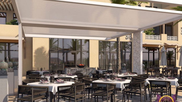 Abstract geometric shapes with a rainbow gradient.