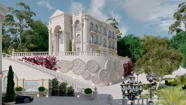 This picture shows a luxurious bathroom with gold accents and marble flooring. The walls are tiled in shades of cream and brown, while the shower area is separated with a glass wall and door. There are two white pedestal sinks flanking a modern mirror, and a large window above a freestanding soaking bathtub. A variety of plants add some natural color to the space.