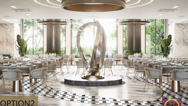 This picture shows an interior design with a contemporary style. It has dark grey walls and dark hardwood floors set against off-white furniture, including a curved sofa, an armchair and an ottoman. A large, glass-enclosed fireplace is the focal point of the room, providing a cozy atmosphere. Above it hangs a large abstract painting, while bright, green plants add a pop of color and bring life to the space.