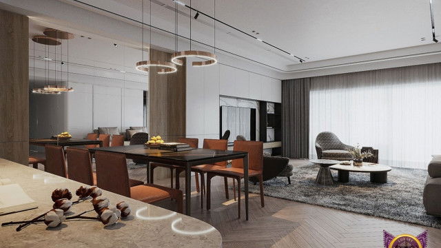 Modern living room design featuring beige walls, a white ceiling complemented by elegant crystal chandeliers, beige furniture with light blue accents, and a large abstract artwork hung on the wall.