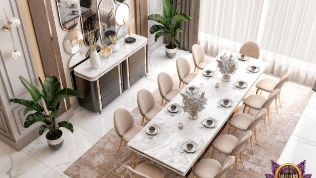 Modern luxury kitchen featuring white cabinets, marble countertops, stainless steel appliances, center island, and elaborate chandelier.