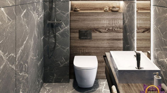 Modern luxury residential interior featuring an open-plan kitchen, living room and dining area with marble tiled floor and a contemporary decorative chandelier.