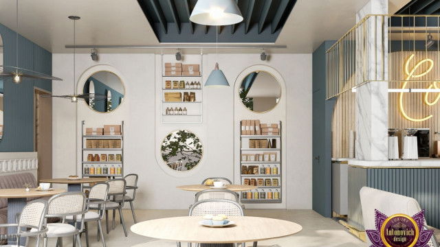 A wood-paneled lounge featuring a large red couch, a white armchair, and a coffee table.