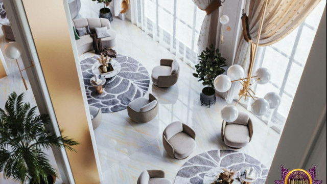 Modern luxury living room with cream-colored leather sofa, decorative rug, and round glass coffee table.