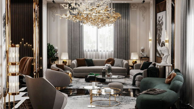 A modern luxury living room featuring a large beige sofa and armchair, a yellow accent chair, and a light-colored coffee table surrounded by a plush white rug.