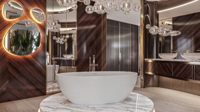 This picture shows a luxurious interior design, featuring a grand staircase with two landings, ornate balustrades and railings, and classical columns. The walls and ceiling are decorated in lavish gold, white, and cream-colored wallpaper, with paintings and sculptures adorning the walls. At the center is an exquisite crystal chandelier, illuminating the entire space.