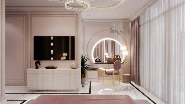 This picture is of a modern and luxurious living room, designed by Antonovich Design. The room features a white leather sectional sofa that is set on a white and gray rug in front of a marble fireplace. There is a glass-top table in the center of the room with two white leather chairs, and there are two round side tables with white lamps on either side. The walls are painted a light mint green and decorated with dark-framed art pieces.