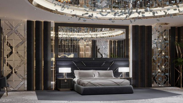 This picture depicts a modern, luxurious living room interior. The room has a contemporary style, featuring furniture in neutral colors such as grey and beige. There is a stylish sofa with a monochromatic pattern, complemented by two armchairs to create a comfortable seating area. The walls have a bright blue wall art painting, which contrasts nicely against the light upholstery of the furniture. There is a sleek marble-topped coffee table in the center to finish off the look of this stunning interior.