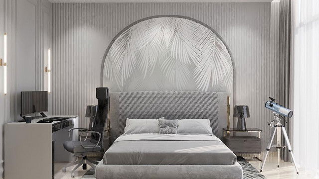 A luxurious interior with intricate molding and a decorative chandelier.