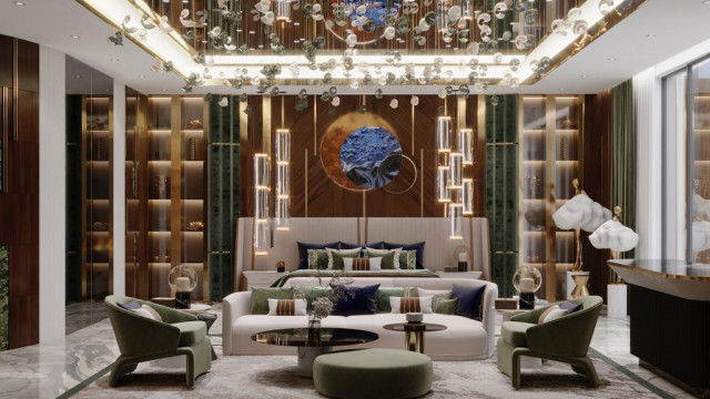 This picture shows a luxurious dining room, designed by Antonovich Design. The room features an intricate wooden table, set with fine silverware and crystal glassware. On the walls are framed artwork and a large chandelier hangs from the ceiling. The room is decorated with elegant furnishings and a plush rug atop the marble floor.