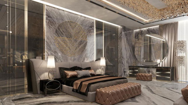 A pool area with a lounge seating area, tiled perimeter and an ornate pendant light.