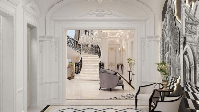 Modern interior with geometric wall pattern featured in pastel shades, and beige marble flooring.