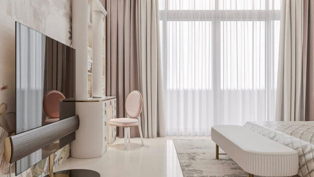 Modern interior with statement furniture in muted earthy tones, a room adorned with luxurious materials, furniture, artwork and accessories.