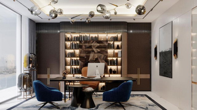 Sculptural staircase with an elegantly curved balustrade and ornamental detailing, showcasing a luxurious and opulent design.