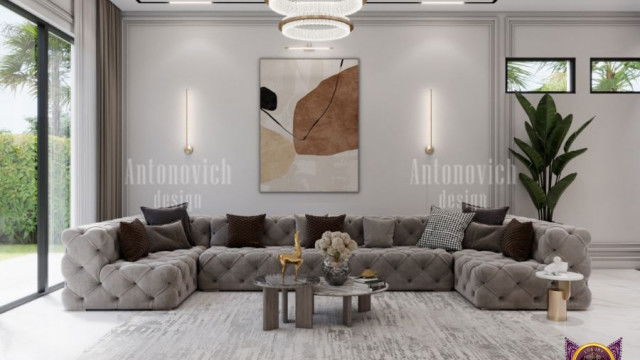 A modern, minimalist kitchen with white cabinets featuring stainless steel handles and countertops, subway tile backsplash and island with seating.