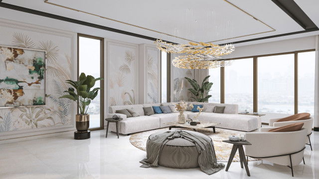 Modern living room with luxuriously upholstered furniture, a neutral colored rug, and a grand fireplace.