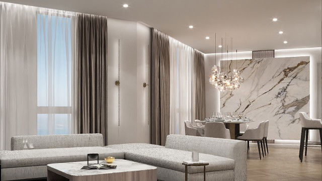 A wooden floor, with two chaise lounge chairs and two side tables arranged in the center, against a backdrop of a feature wall with white vertical and horizontal stripes.