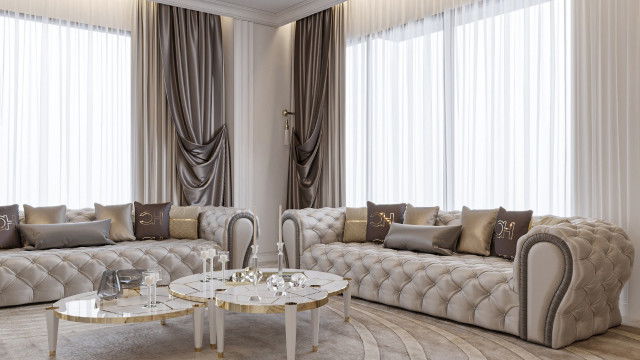 An ornate black grand piano in a marble room with gold trimmings.