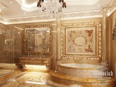 This picture shows a white cupcake with a large swirl of blue buttercream frosting on top. The cupcake is topped with sprinkles, making it look like a starry night sky.